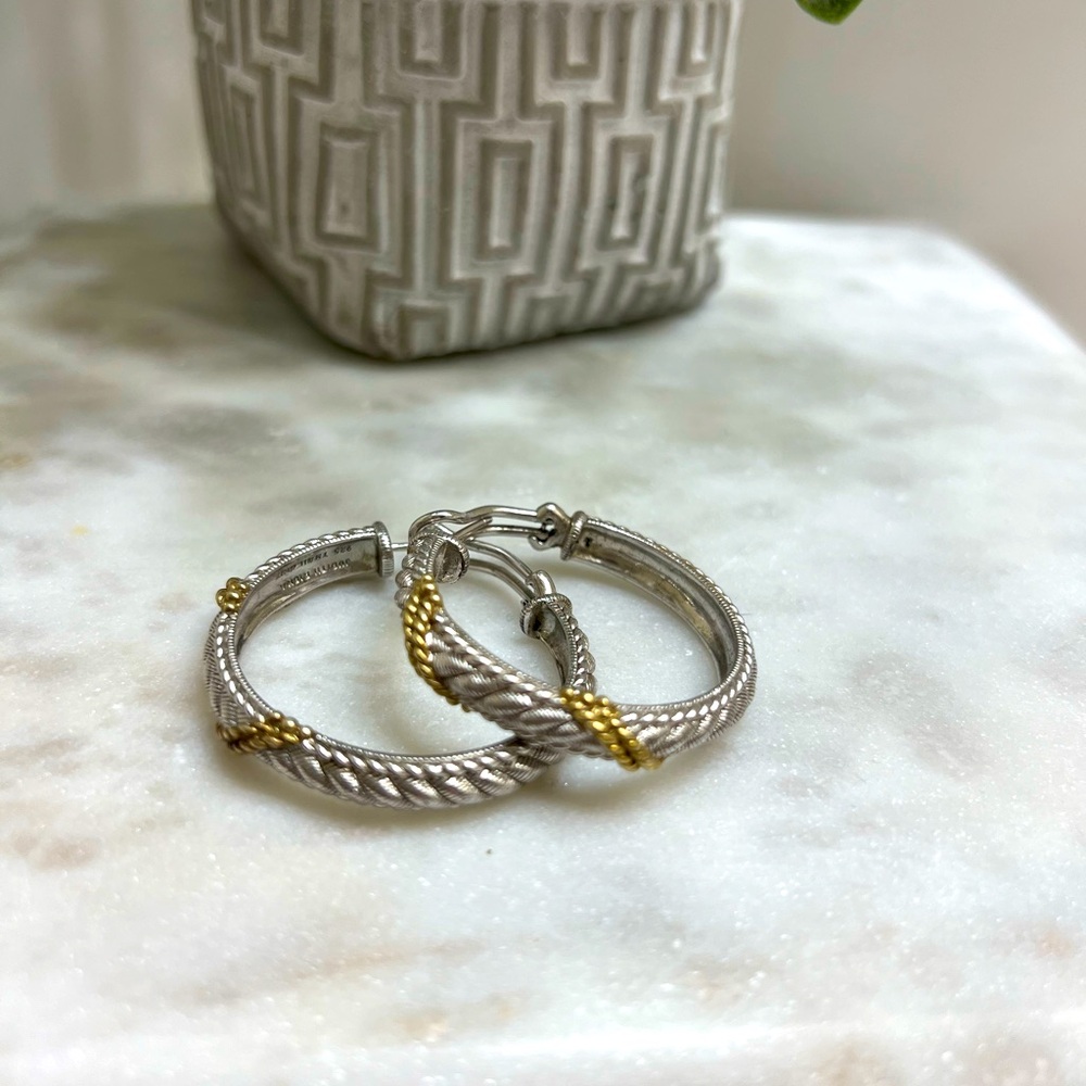 Gold and silver costume jewelry earrings.